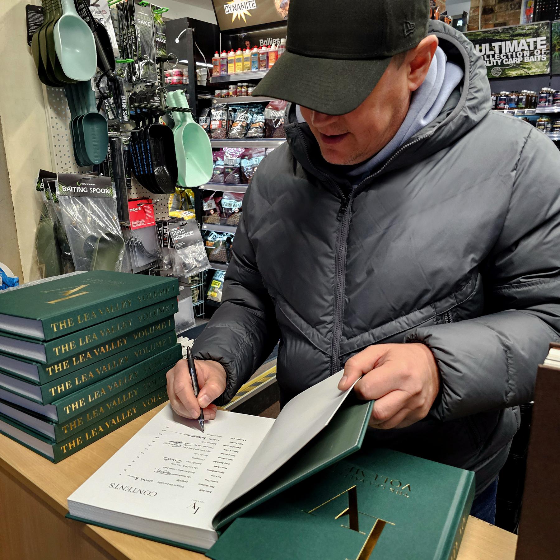 Chris signing The Lea Valley Volume 1 books at Johnson Ross Tackle. Including a chapter from the BAS Chairman - Christian Cox.